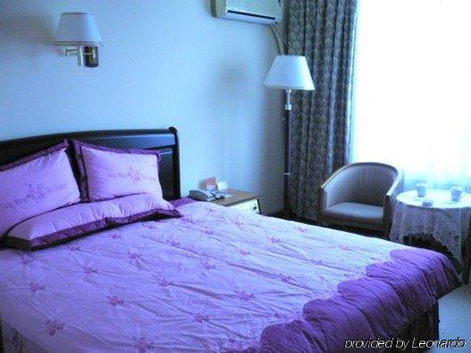 Gan Jin Hotel Τιαντζίν Δωμάτιο φωτογραφία
